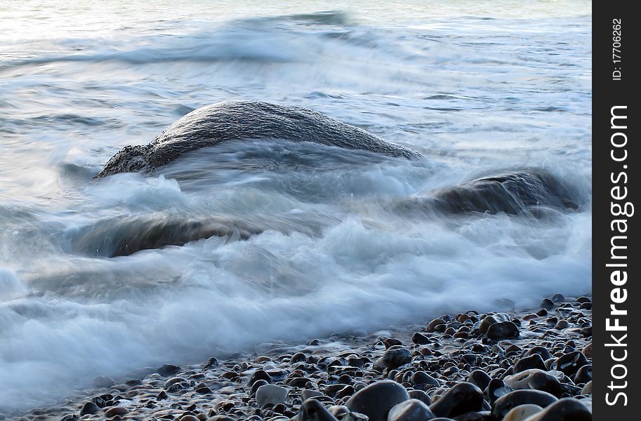 Sea Water Flows Around Rocks