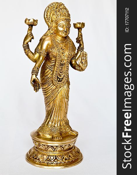 Angled laxmi mata statue hindu demi god on a light background