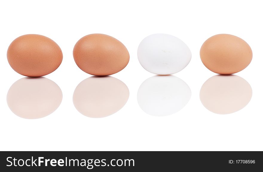 Macro view of four eggs isolated on the white