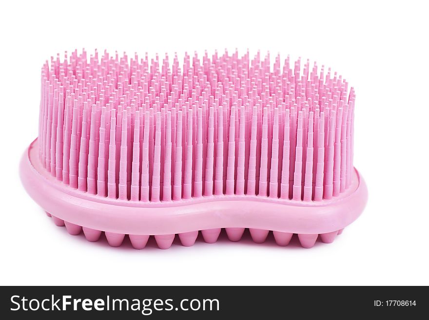 Closeup view of pink rubber sponge isolated on the white