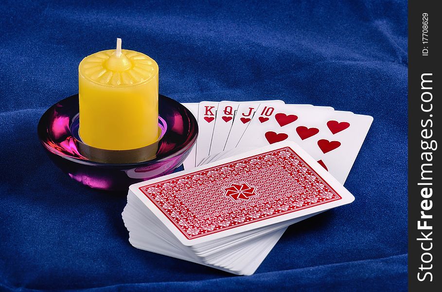 Playing Cards And Candle