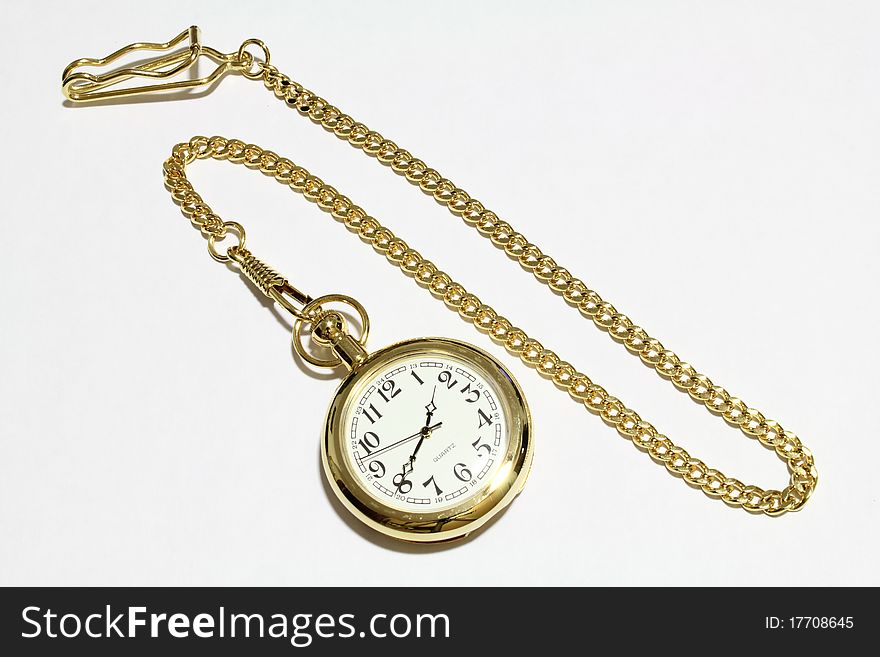 A nice gold clock on white background