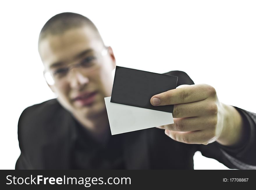 Young businessman holding a business card, small depth of focus, isolated