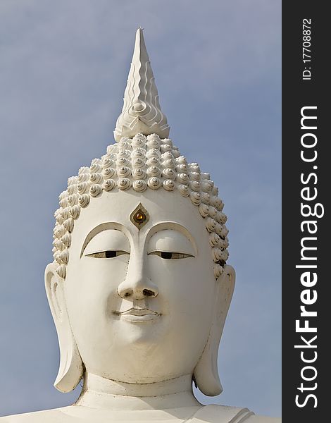 White face buddha image in temple Thailand