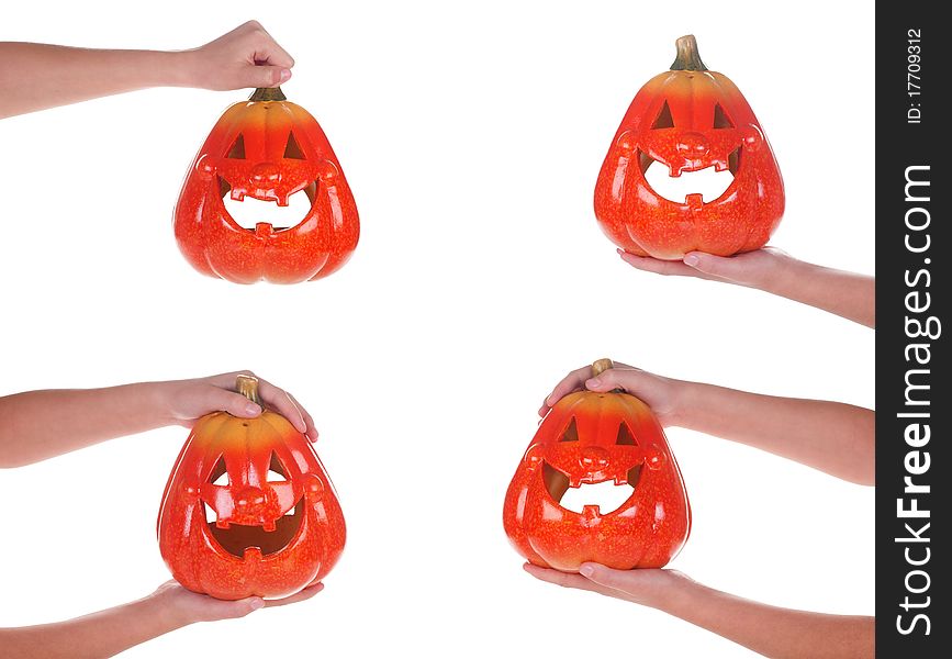 Halloween Pumpkin In A Female Hand, Isolated