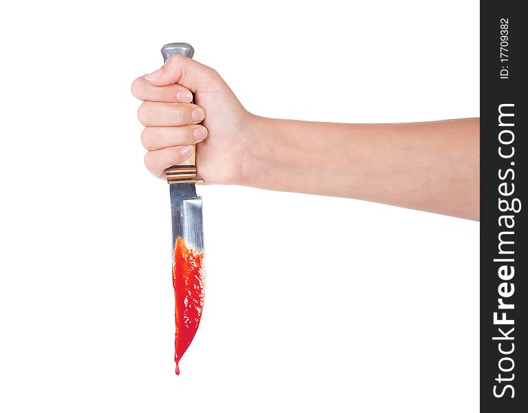 Bloody knife in a female hand, isolated