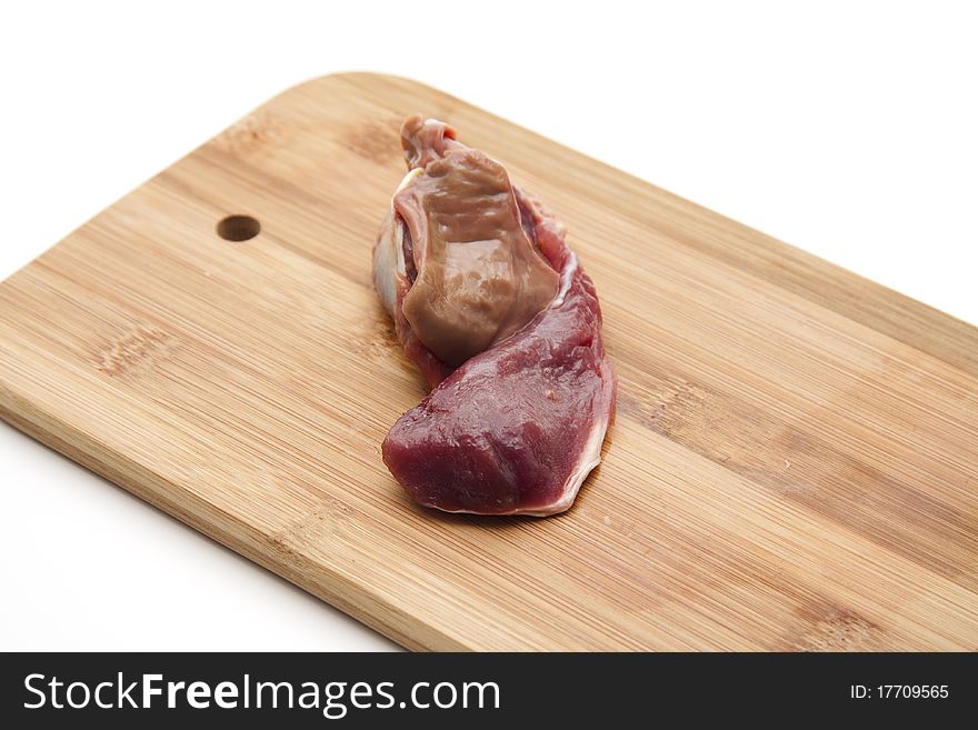 Duck neck with liver on edge board