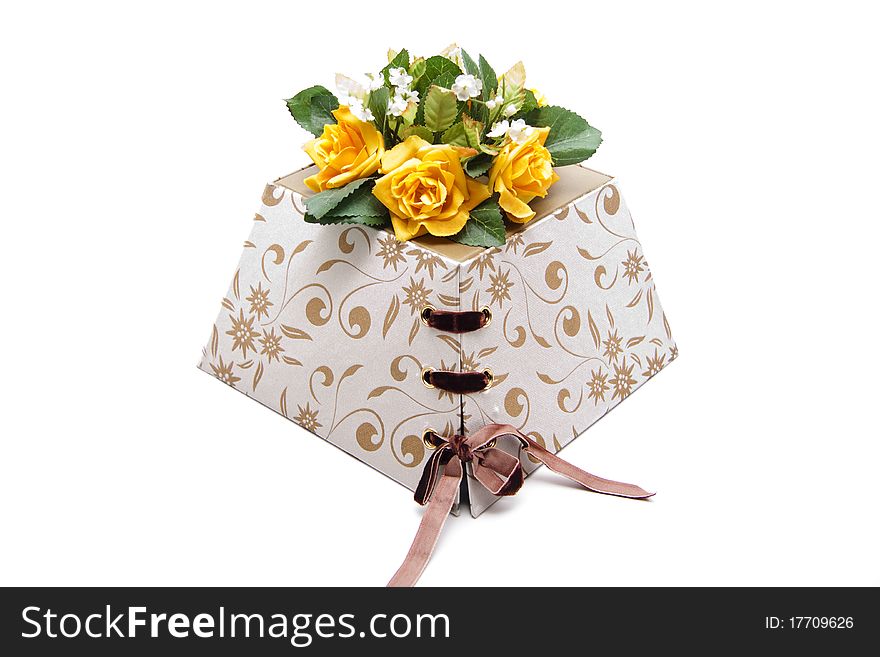 Present packaging of cardboard with bunch of flowers. Present packaging of cardboard with bunch of flowers