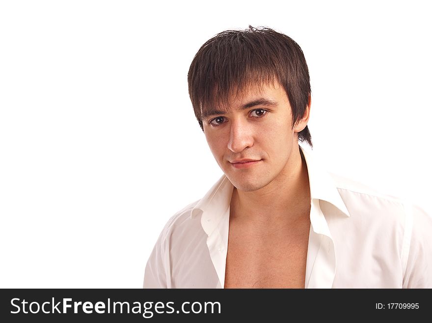 Portrait serious guy in a white shirt isolated. Portrait serious guy in a white shirt isolated