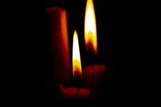 Lighted Candle Stands In A Dark Room Close-up Stock Images