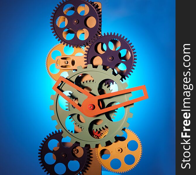   skeleton, clockwork, multi-colored rotating gears and hands, the inside of a watch, on a blue background.   skeleton, clockwork, multi-colored rotating gears and hands, the inside of a watch, on a blue background