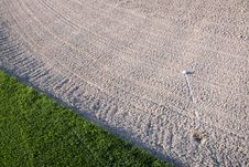 Golf Ball In Sand Trap Royalty Free Stock Image