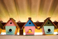 Colorful Bird Houses Under The Roof Stock Image
