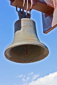 Weathered Cast-iron Bell Against Blue Sky Stock Photos