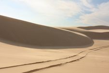 Sand Dune With Tyre Tracks Royalty Free Stock Image