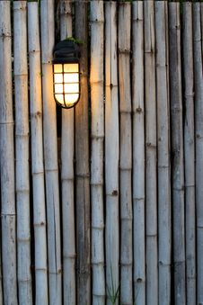 Yellow Lamp On The Bamboo Fence Stock Image Yellow Lamp On The Bamboo Fence Stock Image