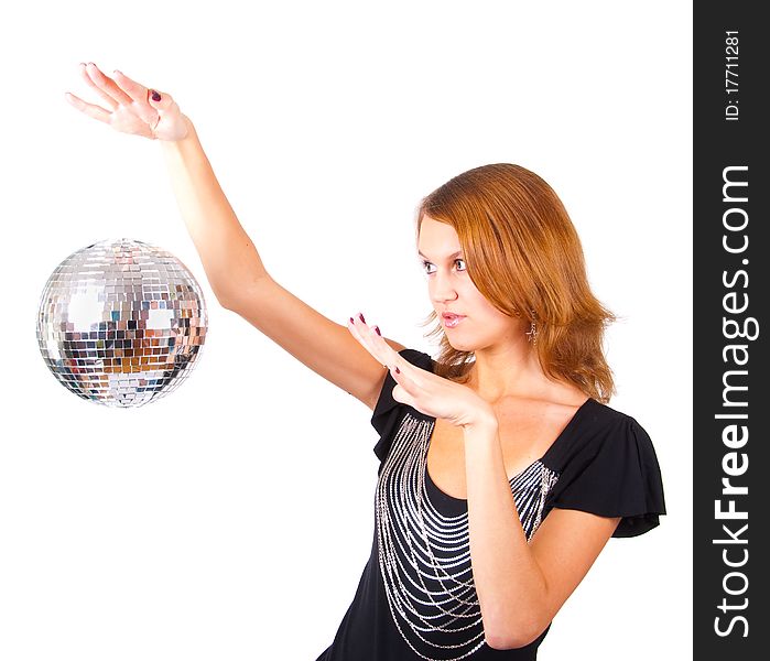 Woman makes magical passes over the mirror-ball. Woman makes magical passes over the mirror-ball