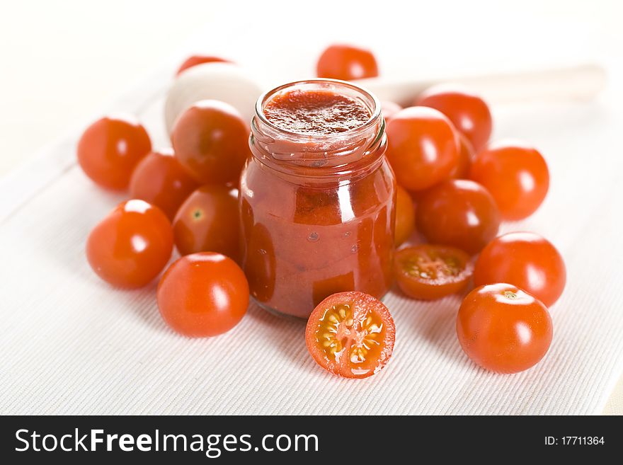 Cherry red tomatoes and ketchup