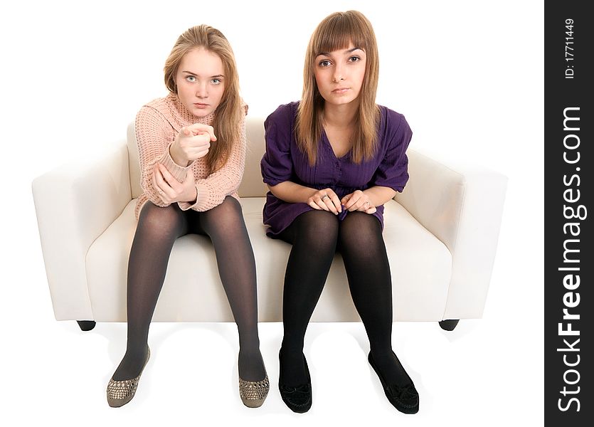 Two friends on a couch pulling your hands forward