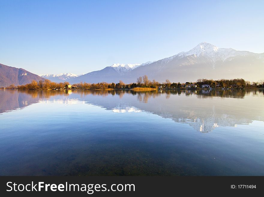 Lake with trees and grass on the banks