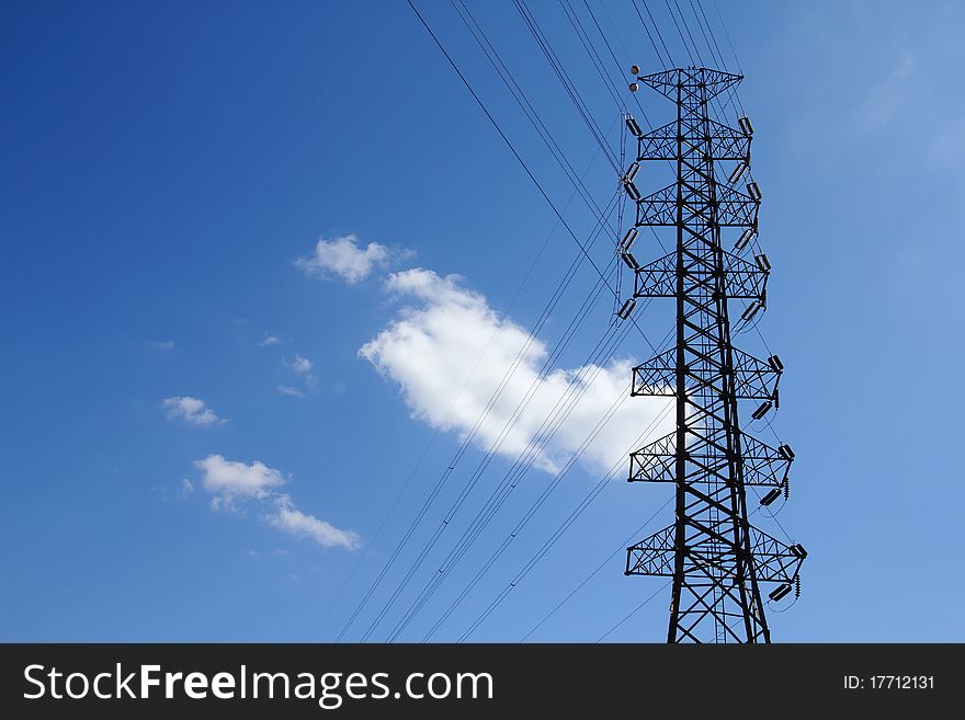 Electrical transmission towers carrying high voltage lines. Electrical transmission towers carrying high voltage lines.