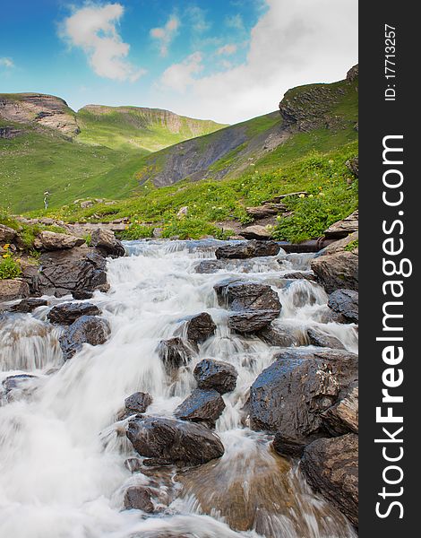 Waterfall in green alps mountains, near Grindelwald. Waterfall in green alps mountains, near Grindelwald