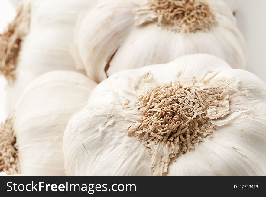 Still life of garlics isolated on a white background.