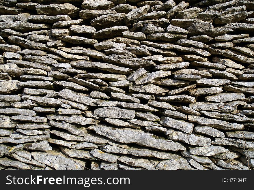 Detail of wall built with flat stones. Detail of wall built with flat stones