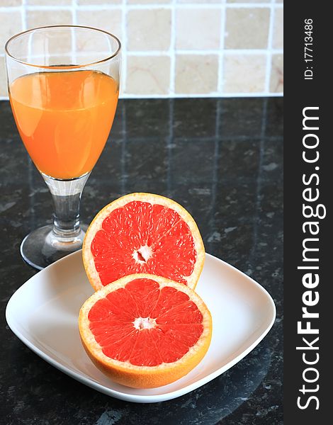 Image of a glass filled with orange juice. Image of a glass filled with orange juice