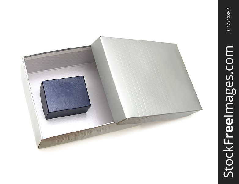 Silver gift-box on white background, with silver ribbon. Silver gift-box on white background, with silver ribbon
