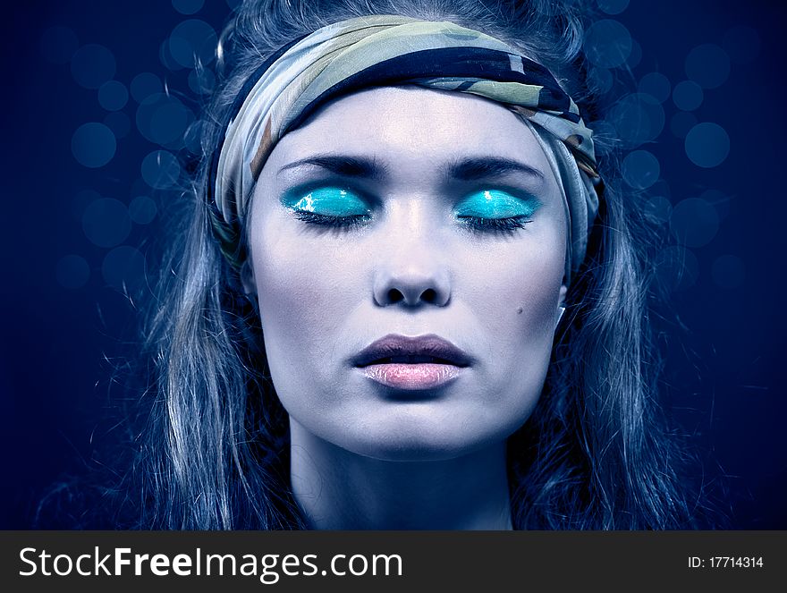 Beautiful Young Woman With Blue Make-up