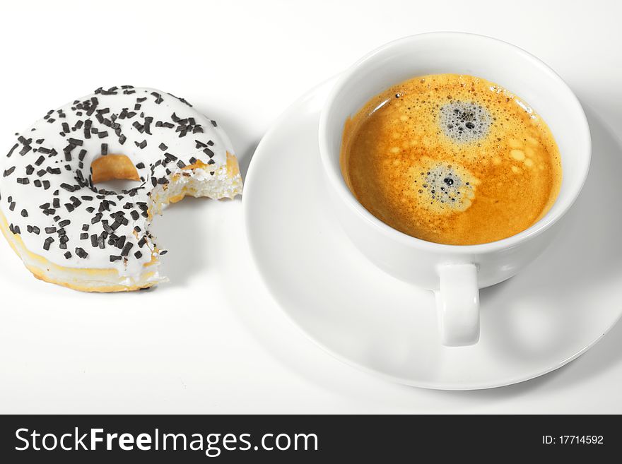 Donut with cup of coffee on white background