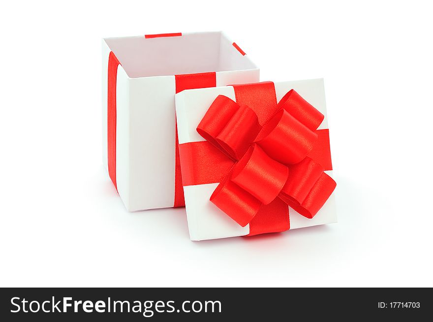 Open empty gift box and red bow. Isolated. Open empty gift box and red bow. Isolated.