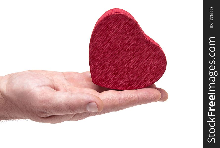 Man's hands gifting heart on valentine day isolated on white