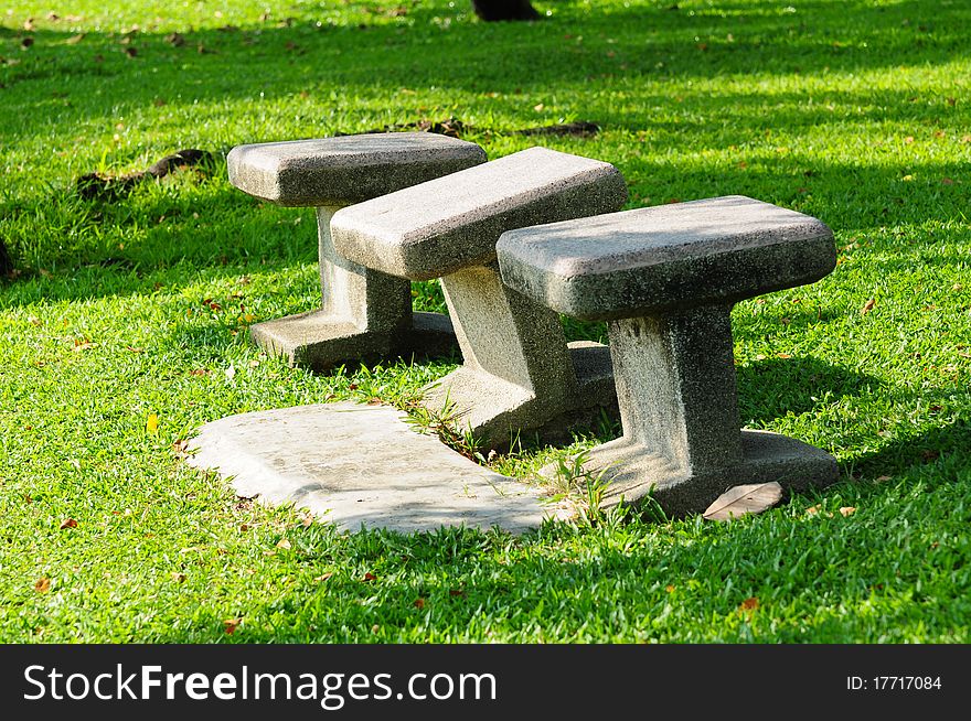 Stone Chairs Standing On The Garden