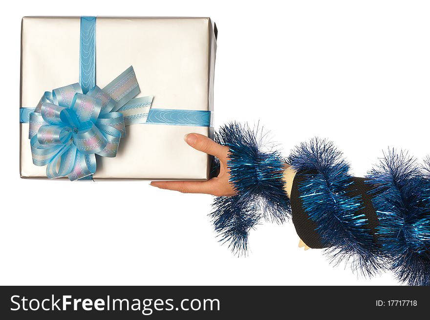 Woman giving a silver box with blue bow as a gift for christmas. Woman giving a silver box with blue bow as a gift for christmas