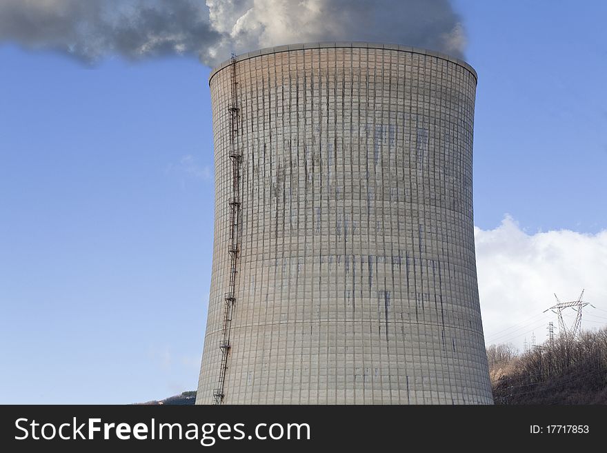Factory chimney belching smoke and polluting. Factory chimney belching smoke and polluting
