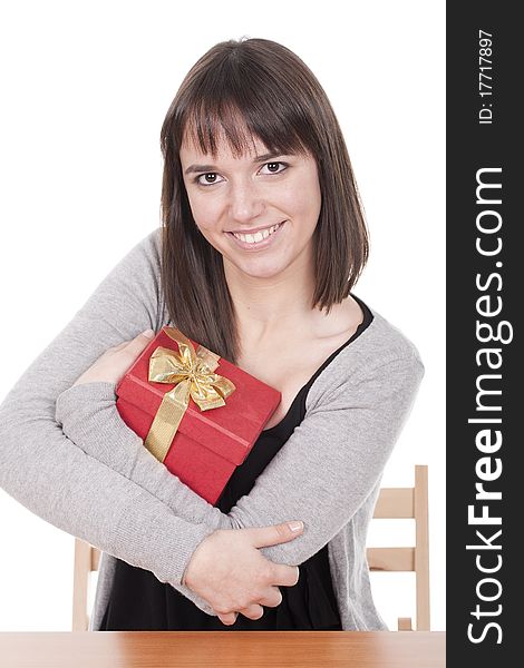 Similing woman holding a gift, a red box. Similing woman holding a gift, a red box