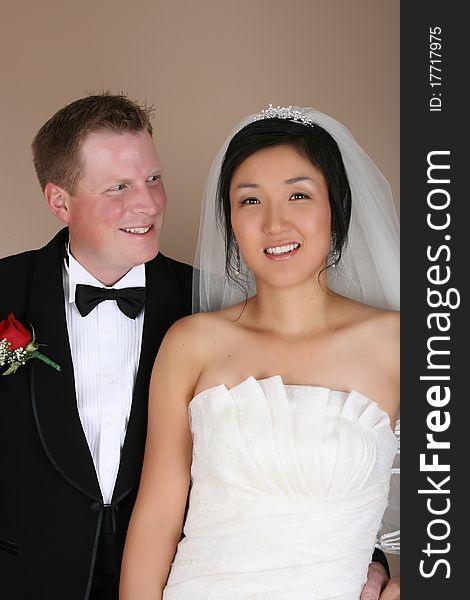 Beautiful couple on their wedding day in traditional attire. Beautiful couple on their wedding day in traditional attire