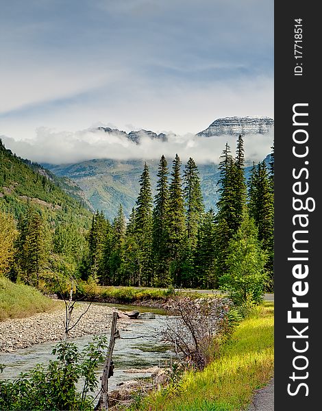 Stream And Cloudy Mt In Glacier