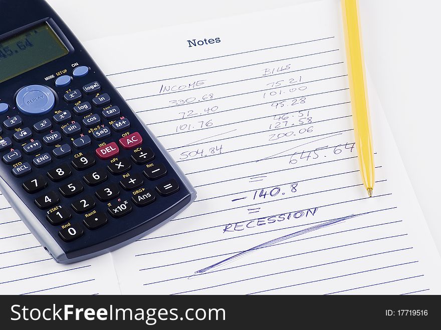 Calculator with notebook and pen - calculations. Calculator with notebook and pen - calculations