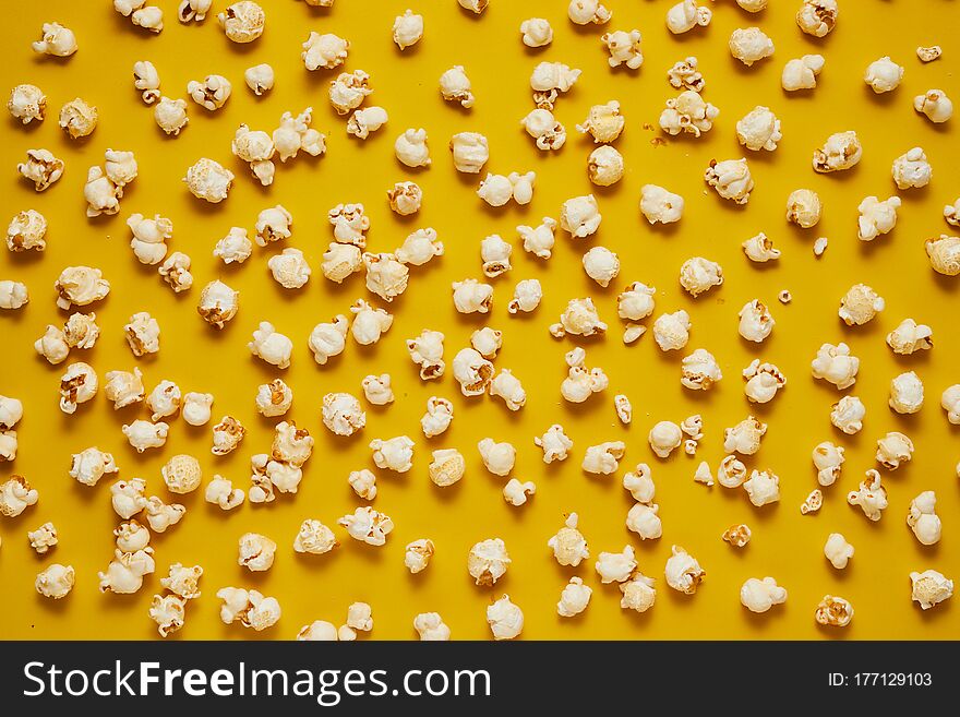 Tasty Caramel Popcorn On Color Background.