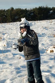 Little Boy Having Fun In Snow With Snowballs Stock Photos Little Boy Having Fun In Snow With Snowballs Stock Photos