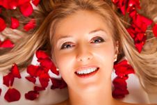 Woman Laying With Rose Petals Stock Photography Woman Laying With Rose Petals Stock Photography