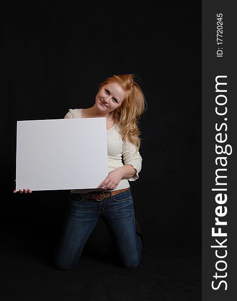 Woman holding blank white sign. Woman holding blank white sign.