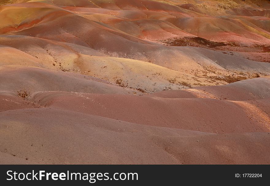 Coloured dunes commonly refered as seven coloured earth in Chamarel Mauritiu. Coloured dunes commonly refered as seven coloured earth in Chamarel Mauritiu