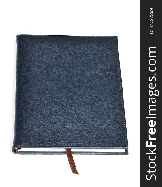 Navy leather notebook on white background.