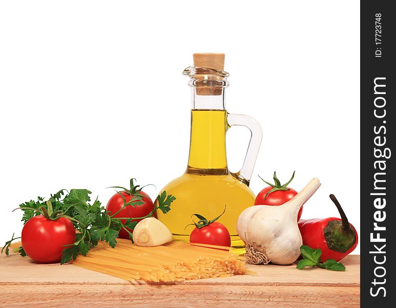 Ingredients for pasta sauce (cherry tomatoes, oil ,garlic, greens)