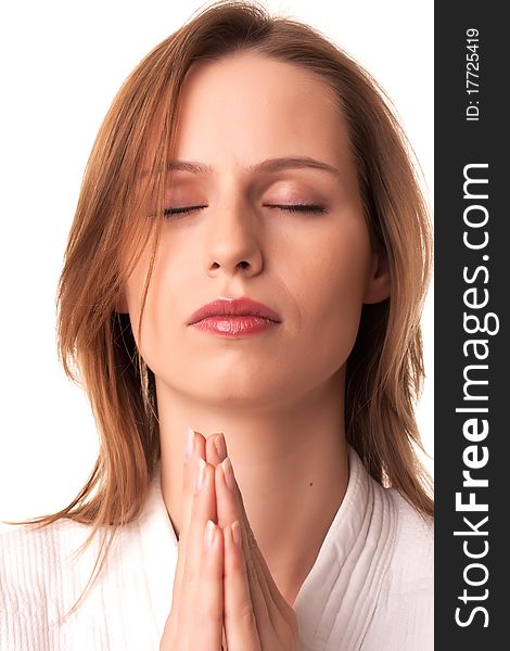 Young Woman Sitting With Pray Gesture