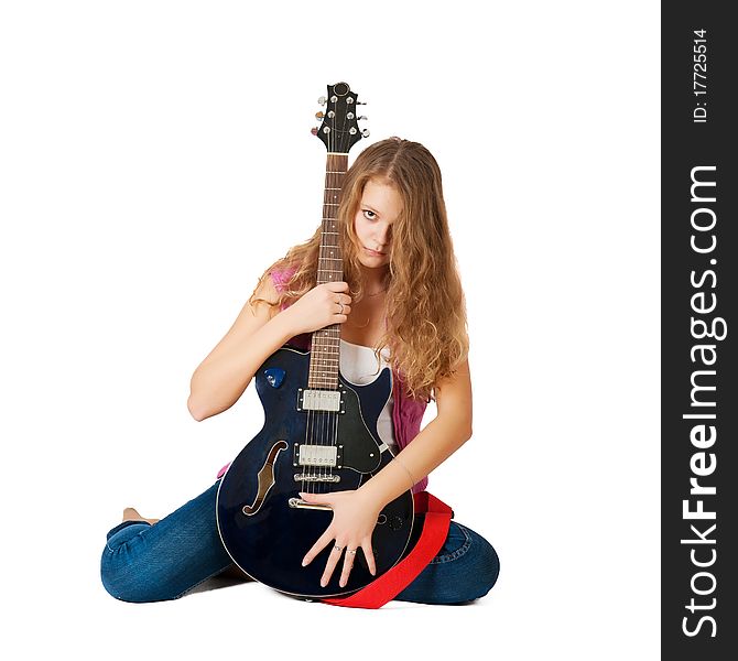 Young girl with a guitar on a white background